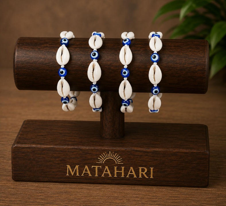 Pulsera concha puri con ojo turco
