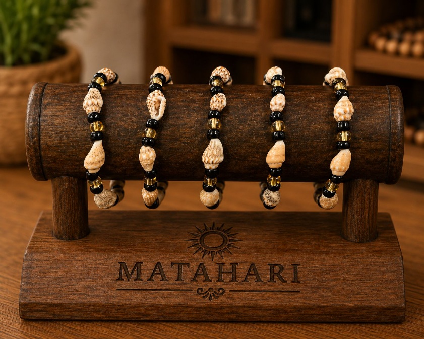 Pulsera mostasilla dorada con concha